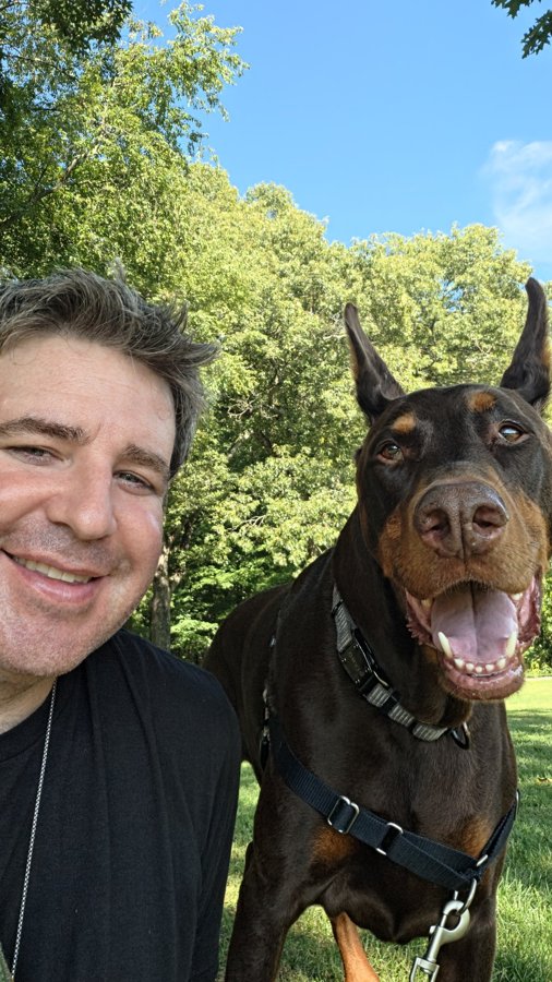Greg with Moose the Doberman